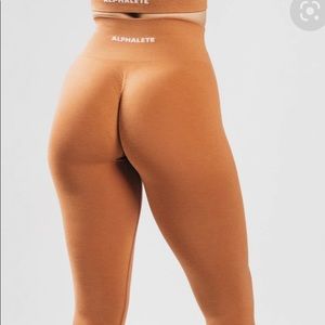 Alphalete Amplify Mandarin Small. Like New only worn a few times.